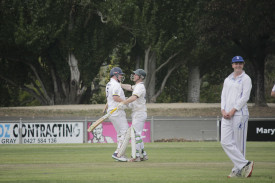 Captain Matt Smith celebrates with Daniel Romeo as the Laane premiership party got underway. Photo: 280323 20
