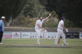 Nicholas Henderson gets day two underway with the ball for Colts Phelans. Photo number: 310323 02