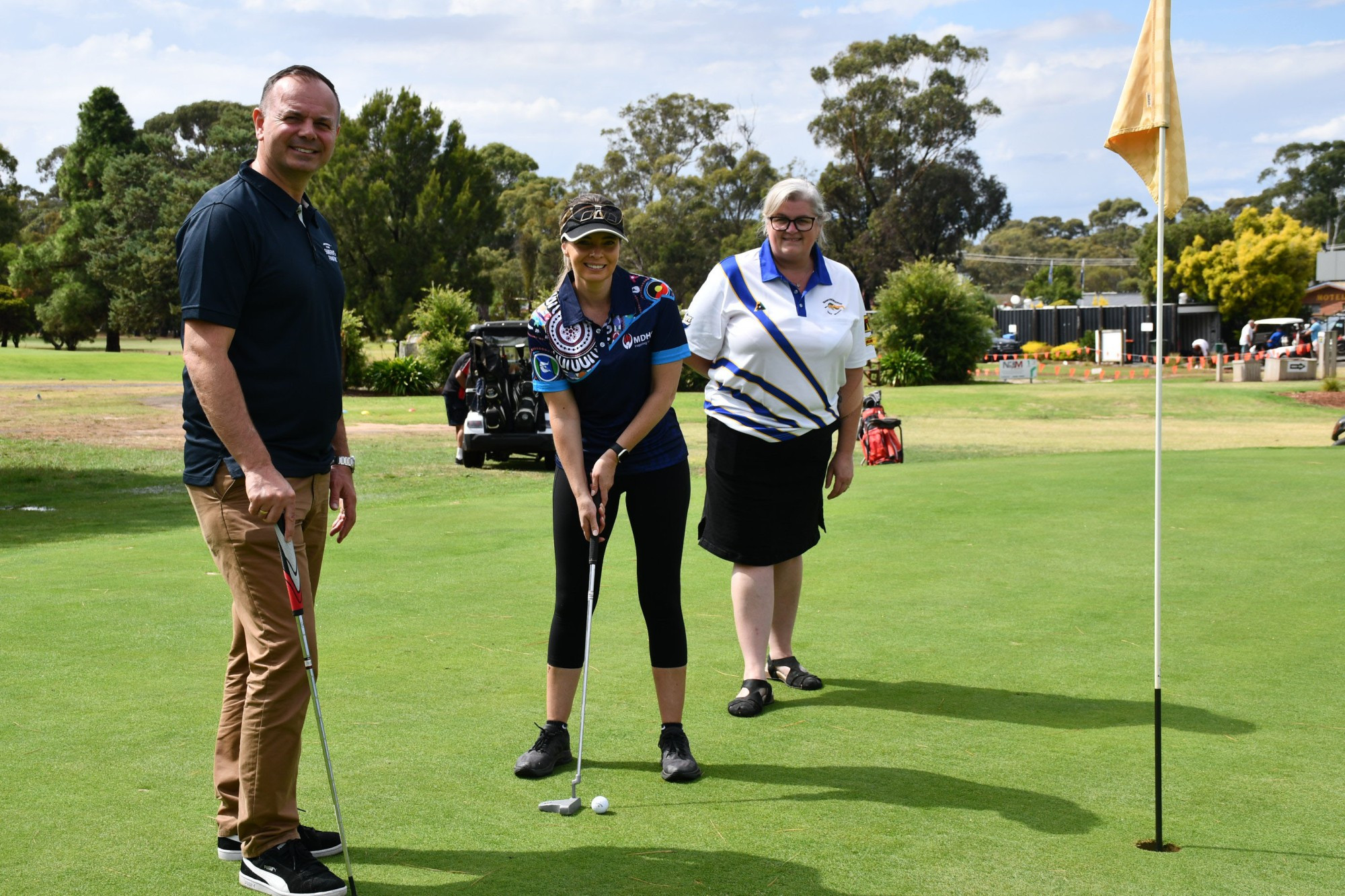 True Foods’ Robert Nackovski, MDHS’ Kelly Mason and Maryborough Golf Club’s Kelly Walker were all on hand to celebrate the charity golf day. Photo: 310323 11