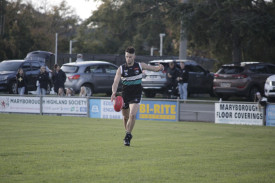 Brady Neill looks for an option on the lakeside wing for the Magpies. Photo: 020523 15