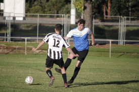 BJ Melton gets the ball away from North Ballarat danger. Photo: 020523 09