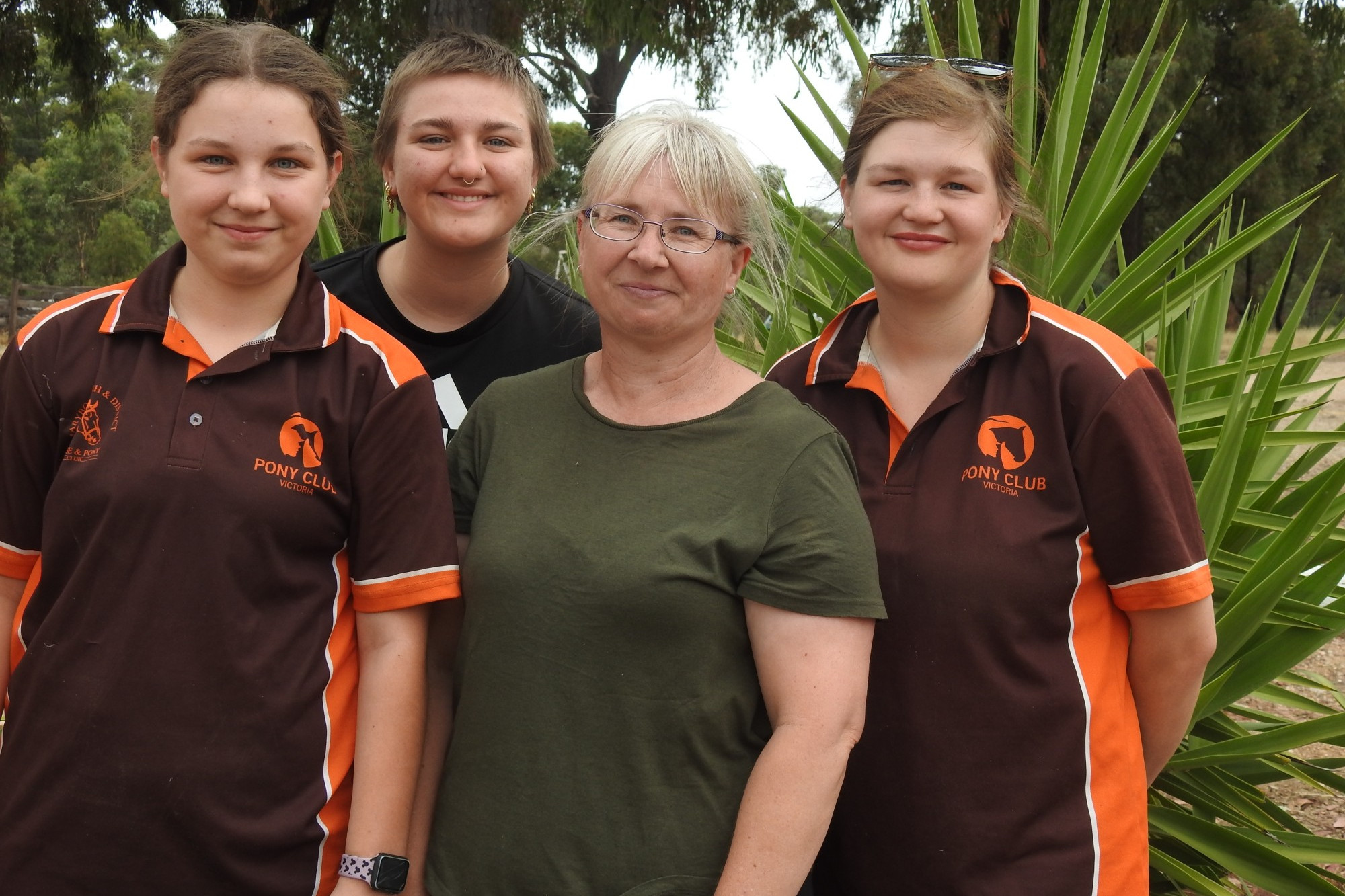 Debbie Ruff (third from left) was recently awarded Pony Club Victoria’s Volunteer of the Year for her dedicated to the club and her nieces Sheridan, Teagan and Kayla Hovey.