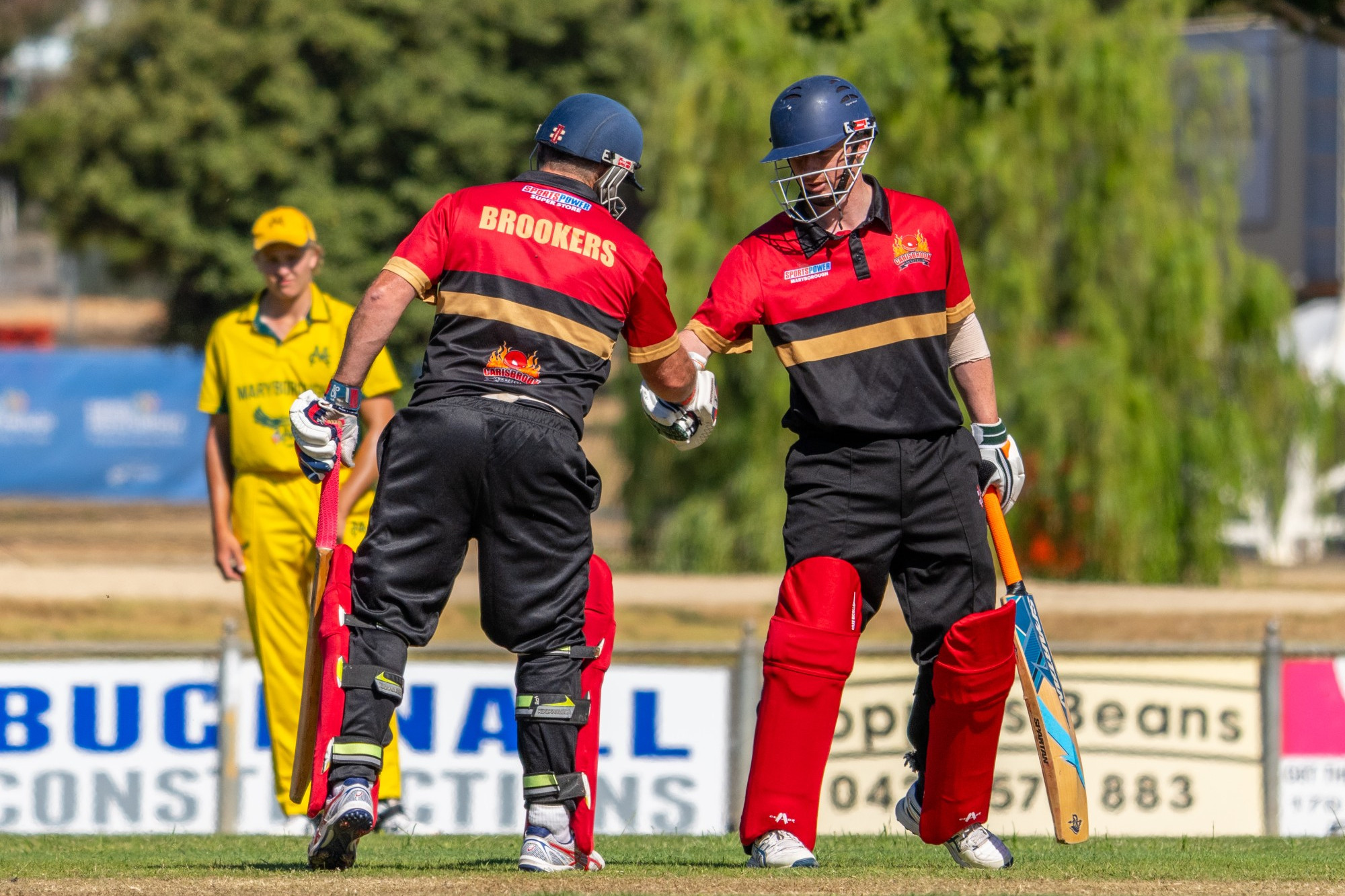 Carisbrook’s Cole Harris made a well-deserved 50, and was acknowledged by Martin Mark for his achievement. Photo: 211223 31