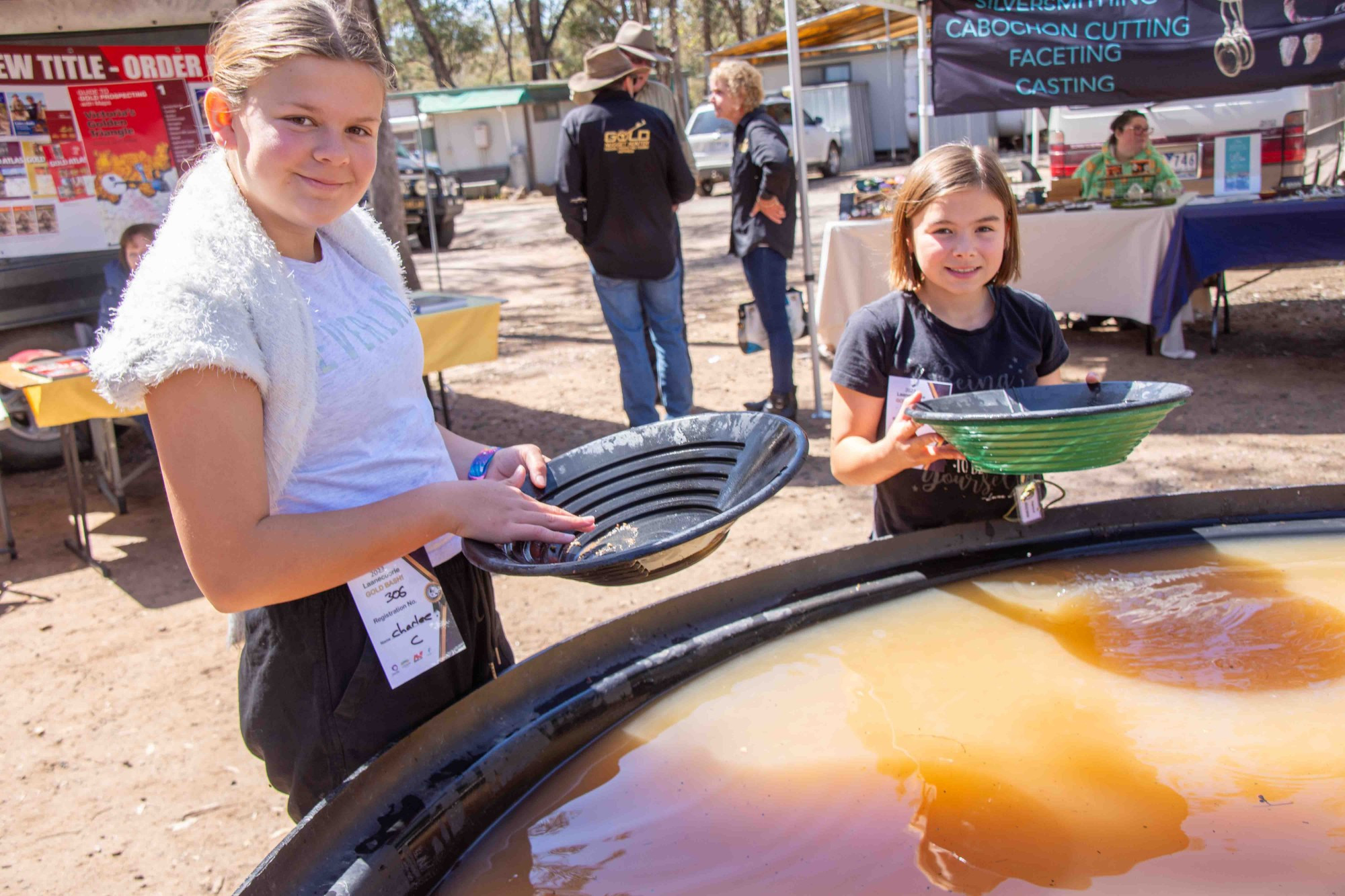 A crowd gathered for the 11th Laanecoorie Gold Bash over the weekend, learning about and celebrating all things gold. Charlee Rose Howell and Sienna Howell of Talbot tried their hand at panning. Photo: 101023 01