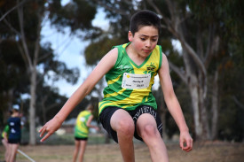 Under 10 athlete Hardy completes the long jump. Photo: 171023 15