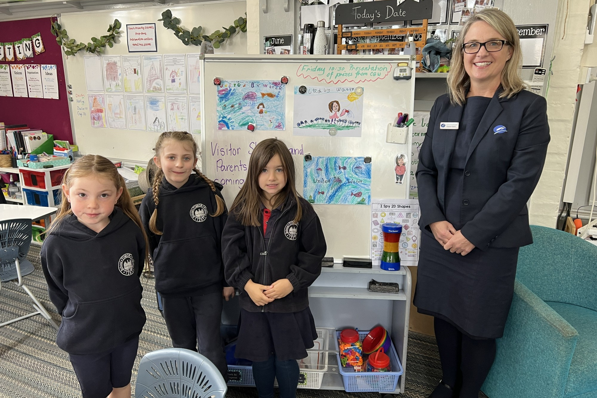 Shannon Haintz from Central Highlands Water presented the prizes to Timor Primary School’s Isabella, Aylah and Adeline.