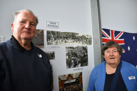 Bert Mason (Bendigo) and Margaret Deason (Maryborough) discovered that they had relatives who attended Timor. Their ancestors are in the photos on the wall behind them. Photo: 271023 11