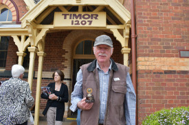 Robert Sewell from Joyce’s Creek attended Timor back in the early 1960s and was a very good runner — pictured with one of the five trophies he won at a school sports event. Photo: 271023 10