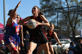 Paige McLean steps in to get her shot away for Carisbrook. Photo: 190923 23