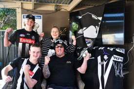 Life-long Collingwood family the Robinsons— Jake, Hayden, Jarrod and Natasha — are already decking out the backyard in preparation for Saturday. Photo: 290923 07