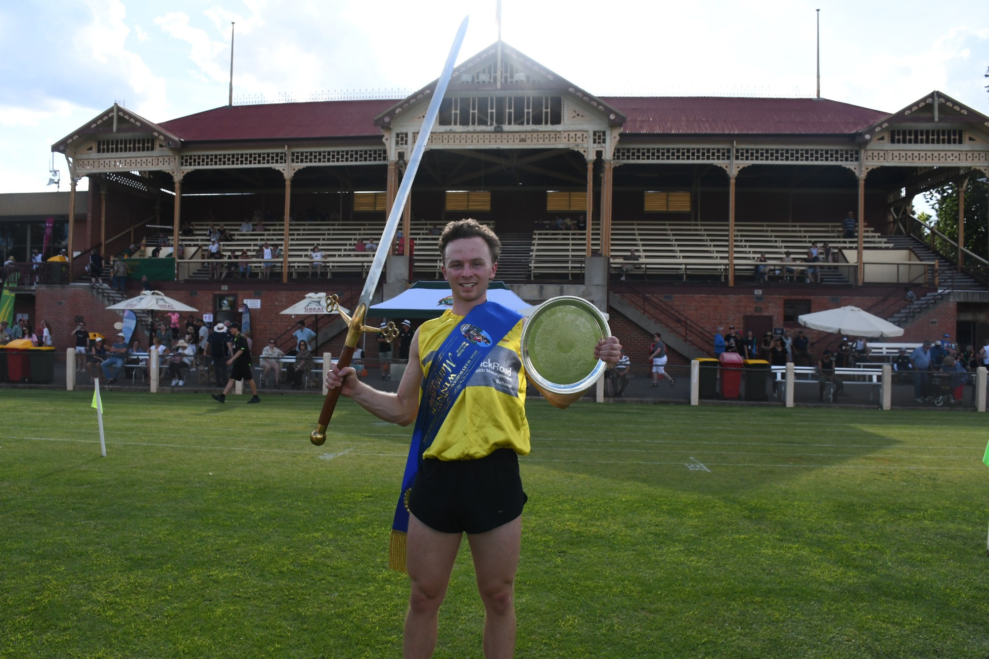 Lawson Power celebrating his win with the traditional sword and shield. Photo: 030124 20