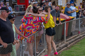 Power’s contingent of fans embrace him after he was declared the victor of the men’s Gift. Photo: Daryl Groves Photography. 