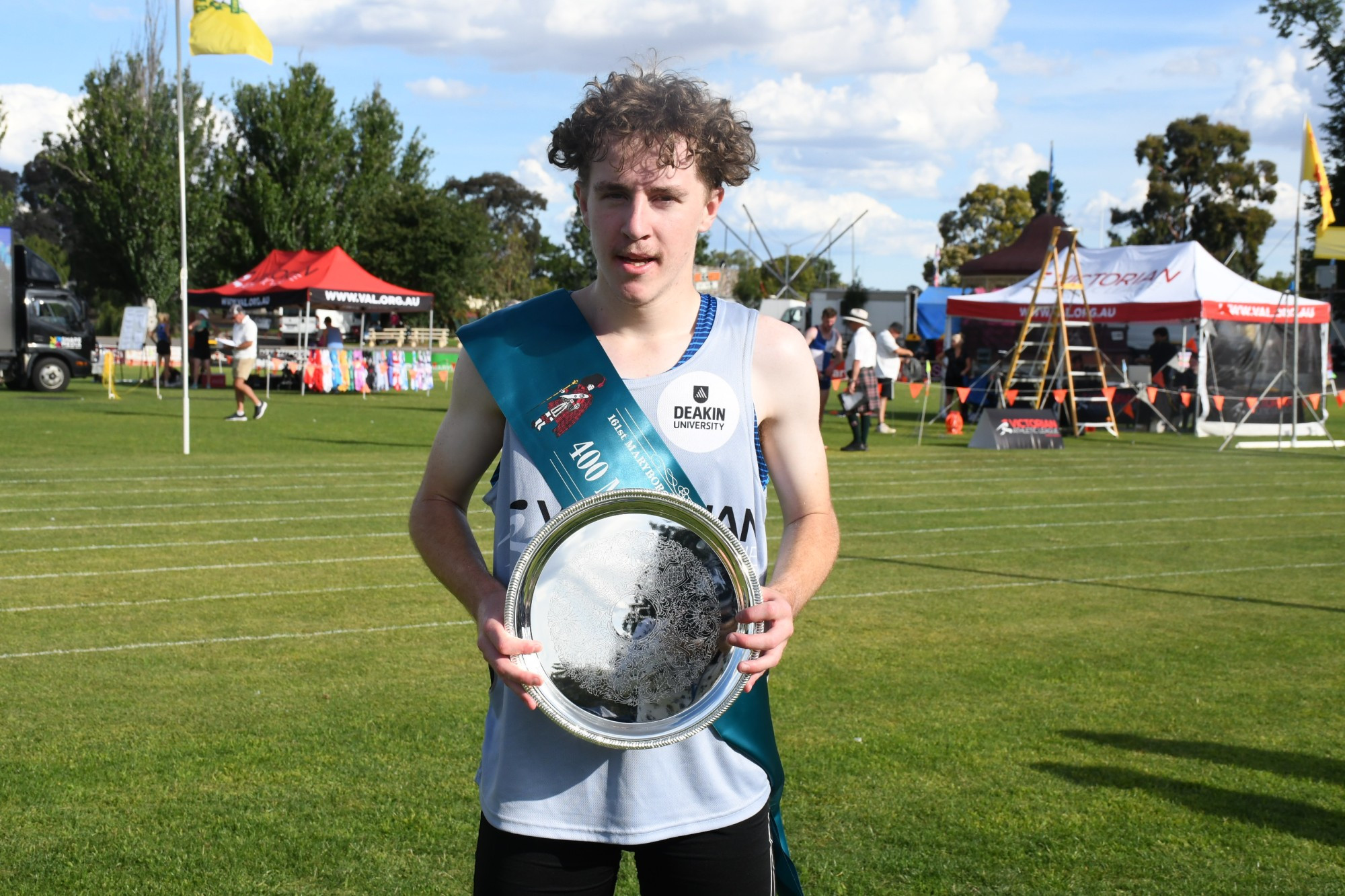 Golden Grove’s Ben Wilson is all smiles after winning the men’s 400 m final. Photo: 050123 22