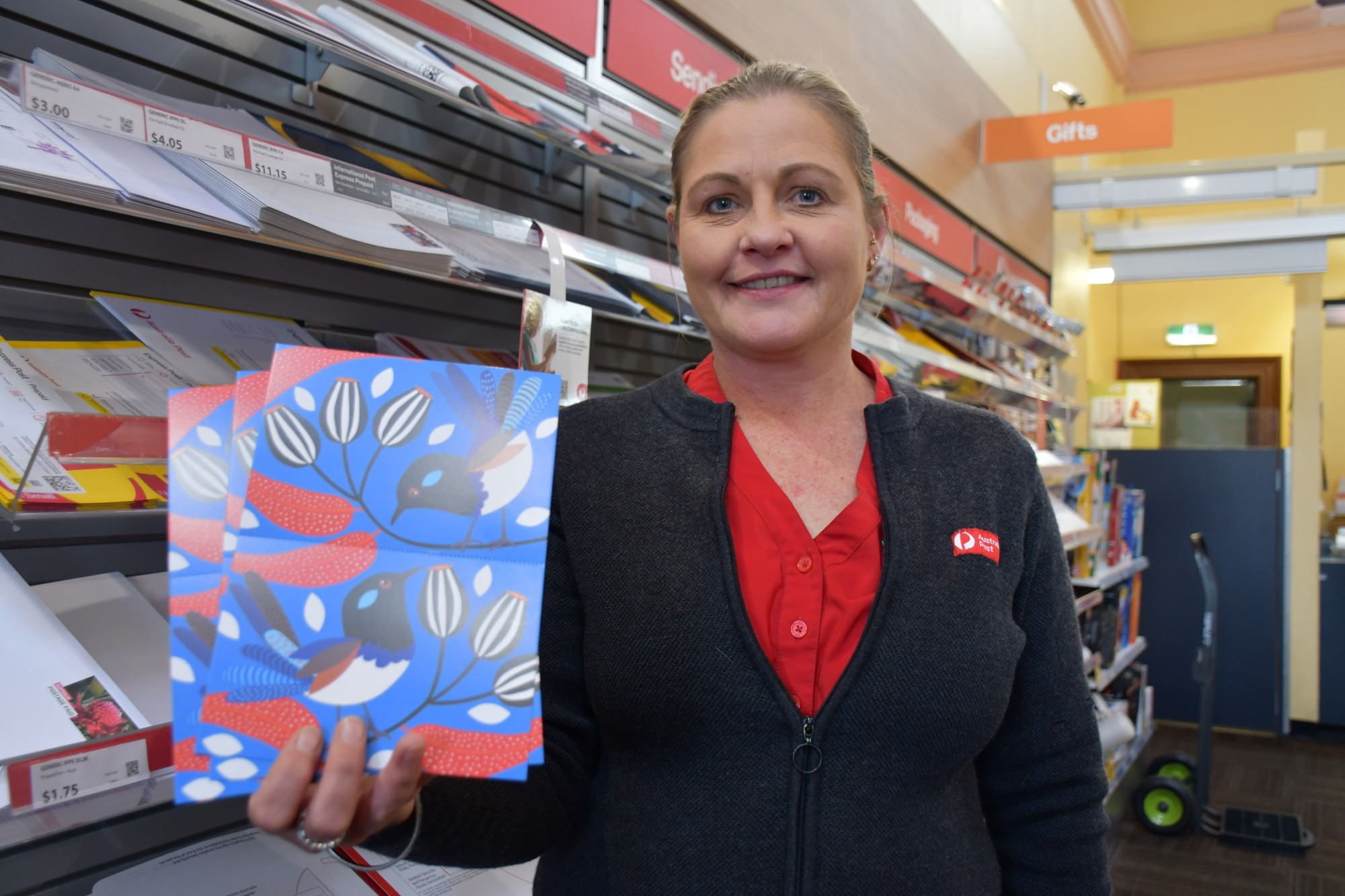 Maryborough Post Office postal manager Kristy Bardsley says a new round of cards are on the way to locals as part of Beyond Blue’s Connection Postcard program.