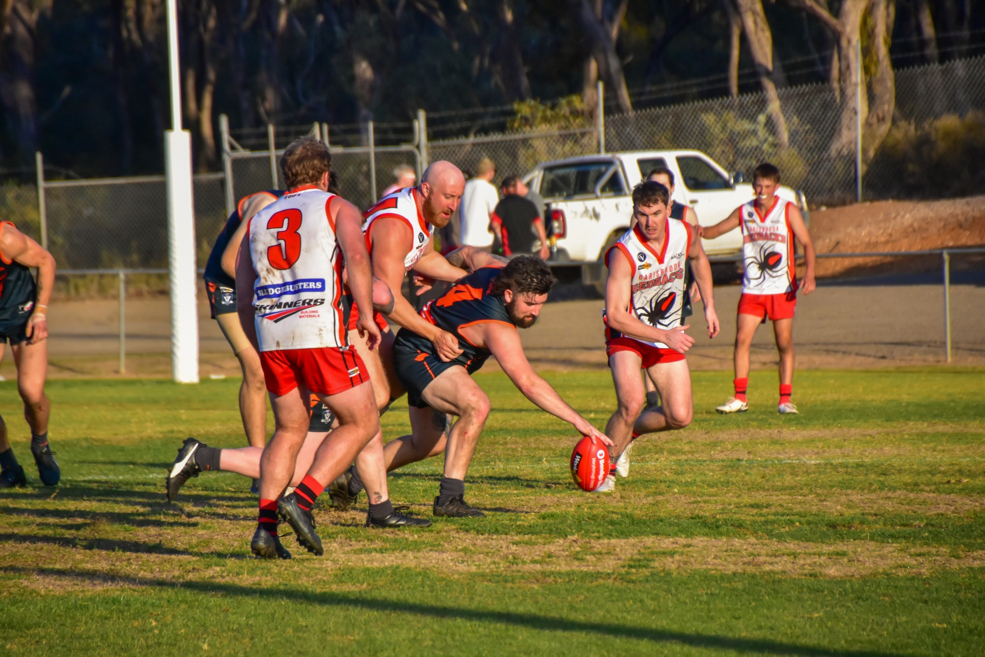 Maryborough Giants’ Mitch Whelan is in among a gathering pack of Redbacks.