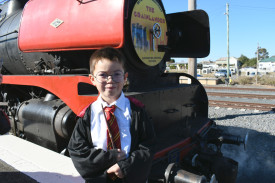 Liam Hannan from Maryborough dressed up for the train’s arrival.