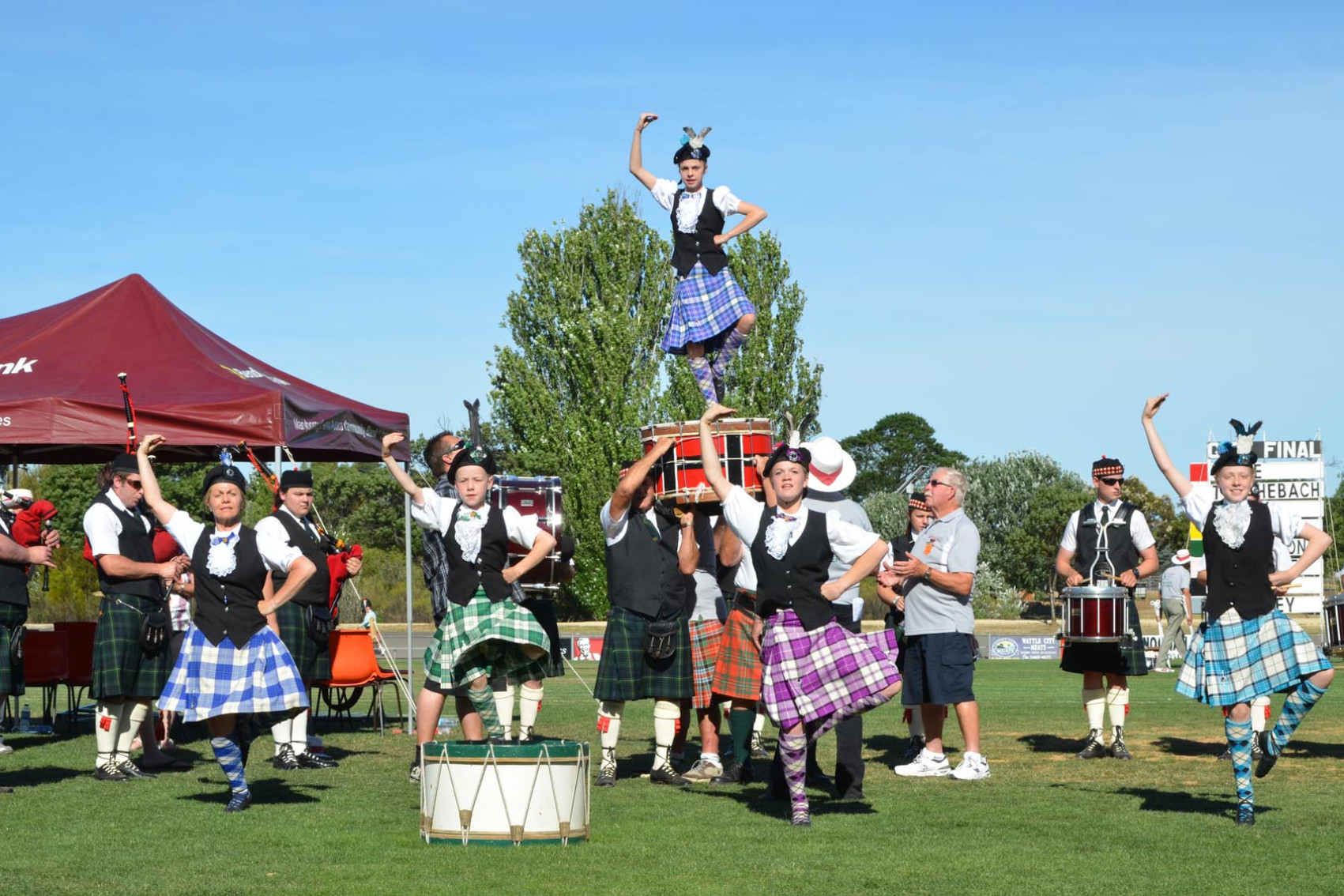 Highland dancing tutor Christine Plover (left) performs for the crowd for New Year&rsquo;s Day Highland Gathering 2013 along with Bessie Penhall, and Christine&rsquo;s own Highland daughters &mdash; that year&rsquo;s Girl on the Drum, Sharni, alongside Monique and Lashae.