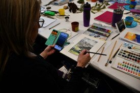 Sharon Hare in the process of making a wonderful landscape paining.