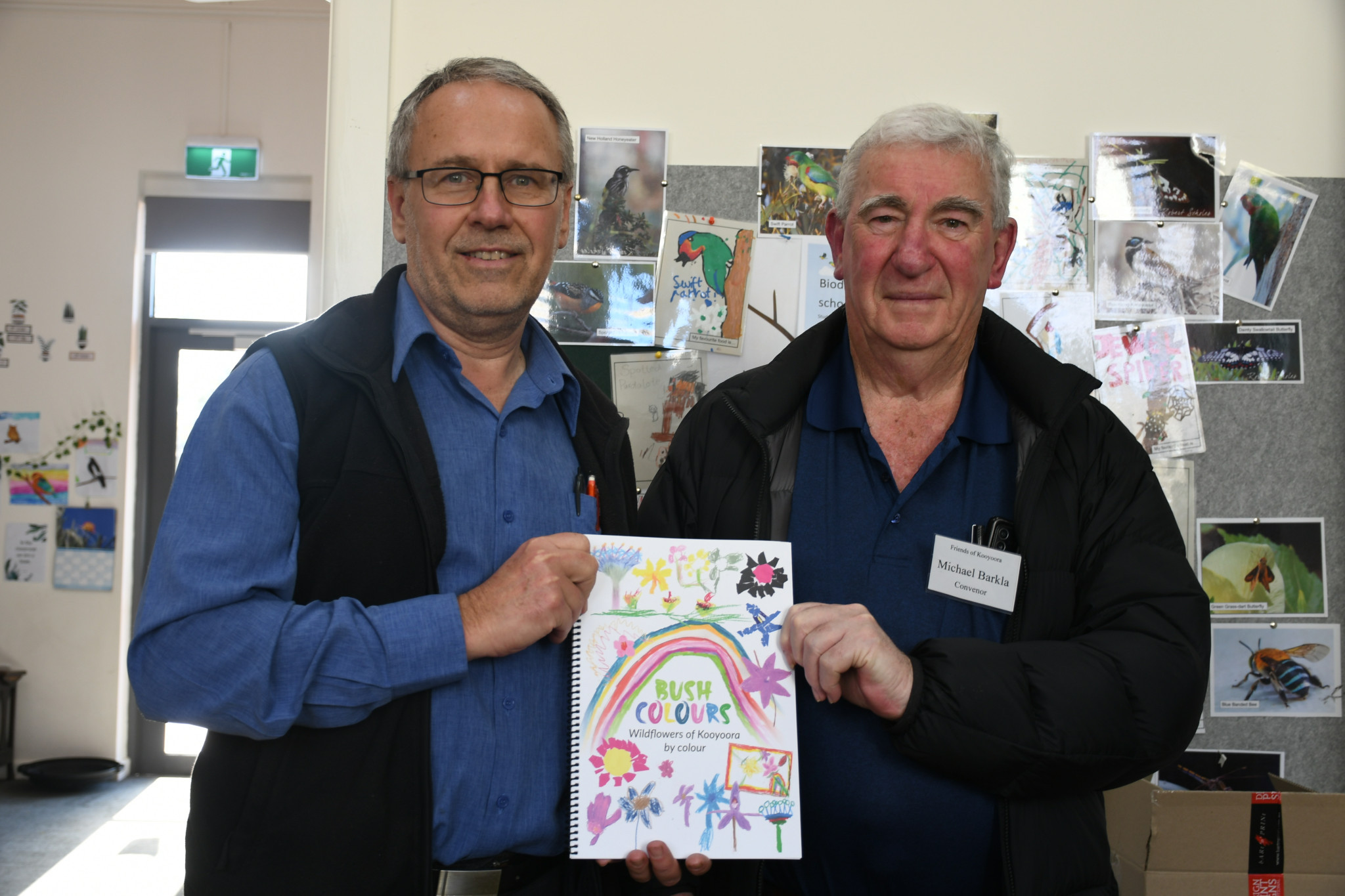 Tarnagulla Primary School principal Leigh Mellberg was presented a copy of the new Bush Colours field guide by Friends of Kooyoora convenor Michael Barkla last Thursday.