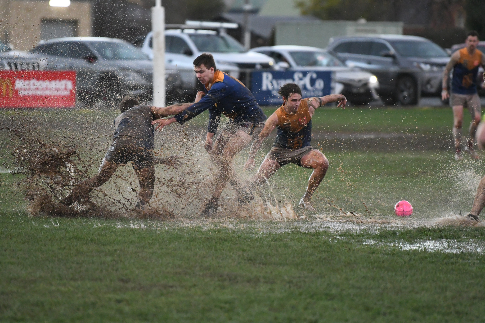 An incredible sight at Carisbrook Recreation Reserve, with Dunolly and Newstead players battling the mud and one another.