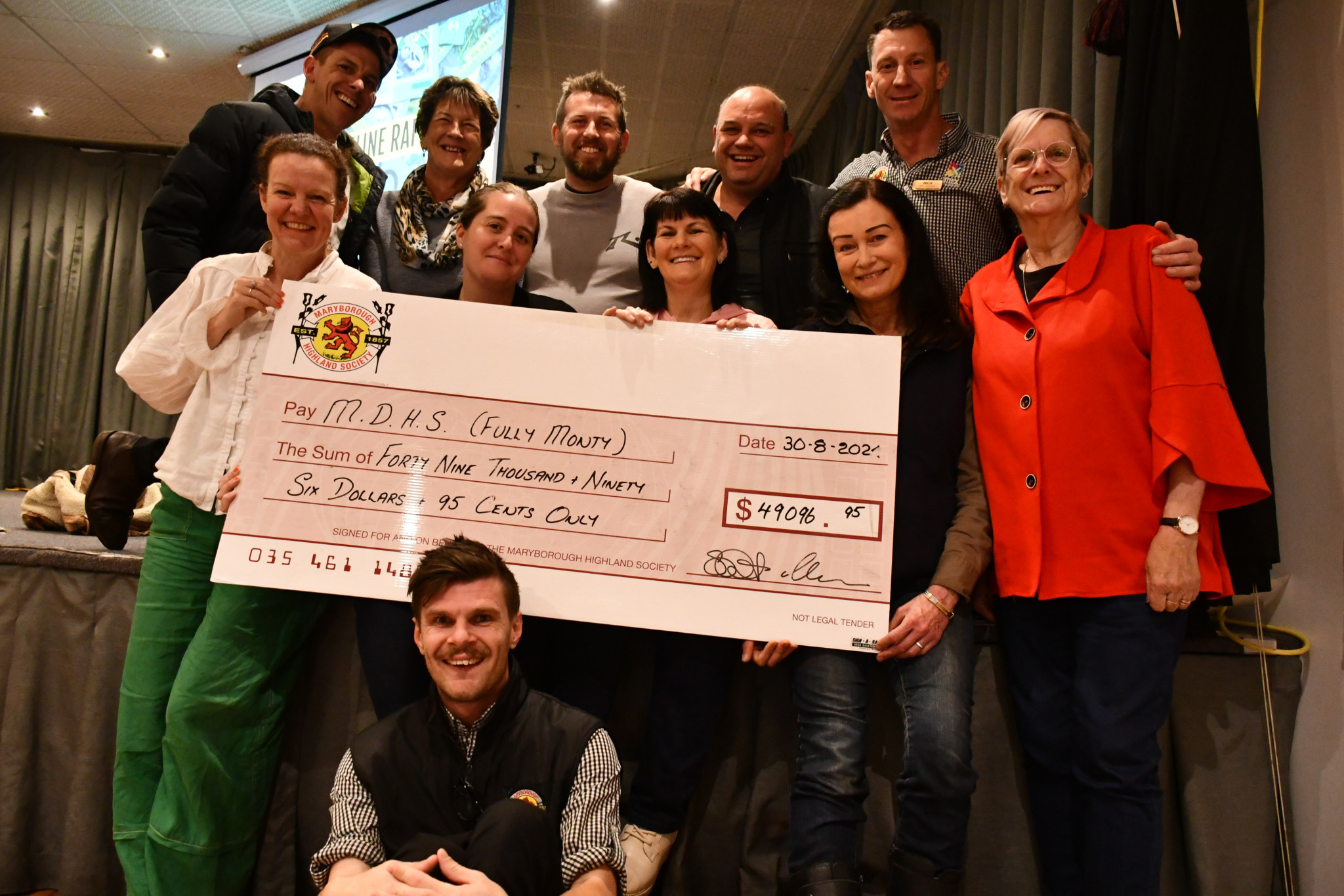 A cheque for nearly $50,000 was presented to the MDHS oncology unit following record donations to the 2024 Full Monty.