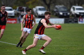 Daniel Zammit clears out of defence for Maldon in their under 17.5 grand final victory.