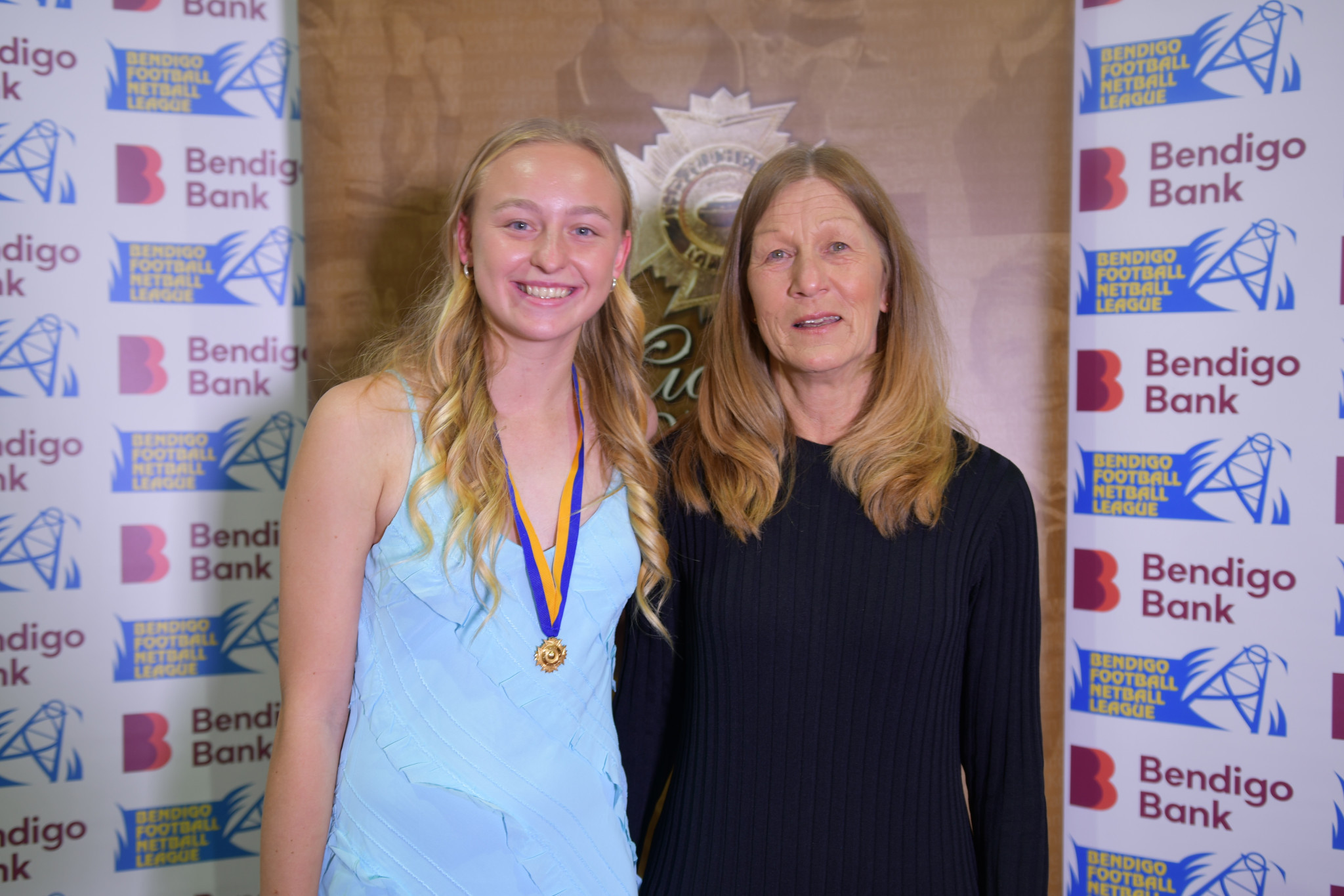 Ella Patten and Carol Sing after Patten claimed her second consecutive 17 and under league best and fairest.