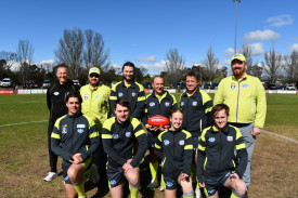 The senior football umpiring crew prior to the grand final.