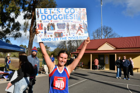 Avoca A grade premiership player Elisa Pica holding up a fan-made sign.