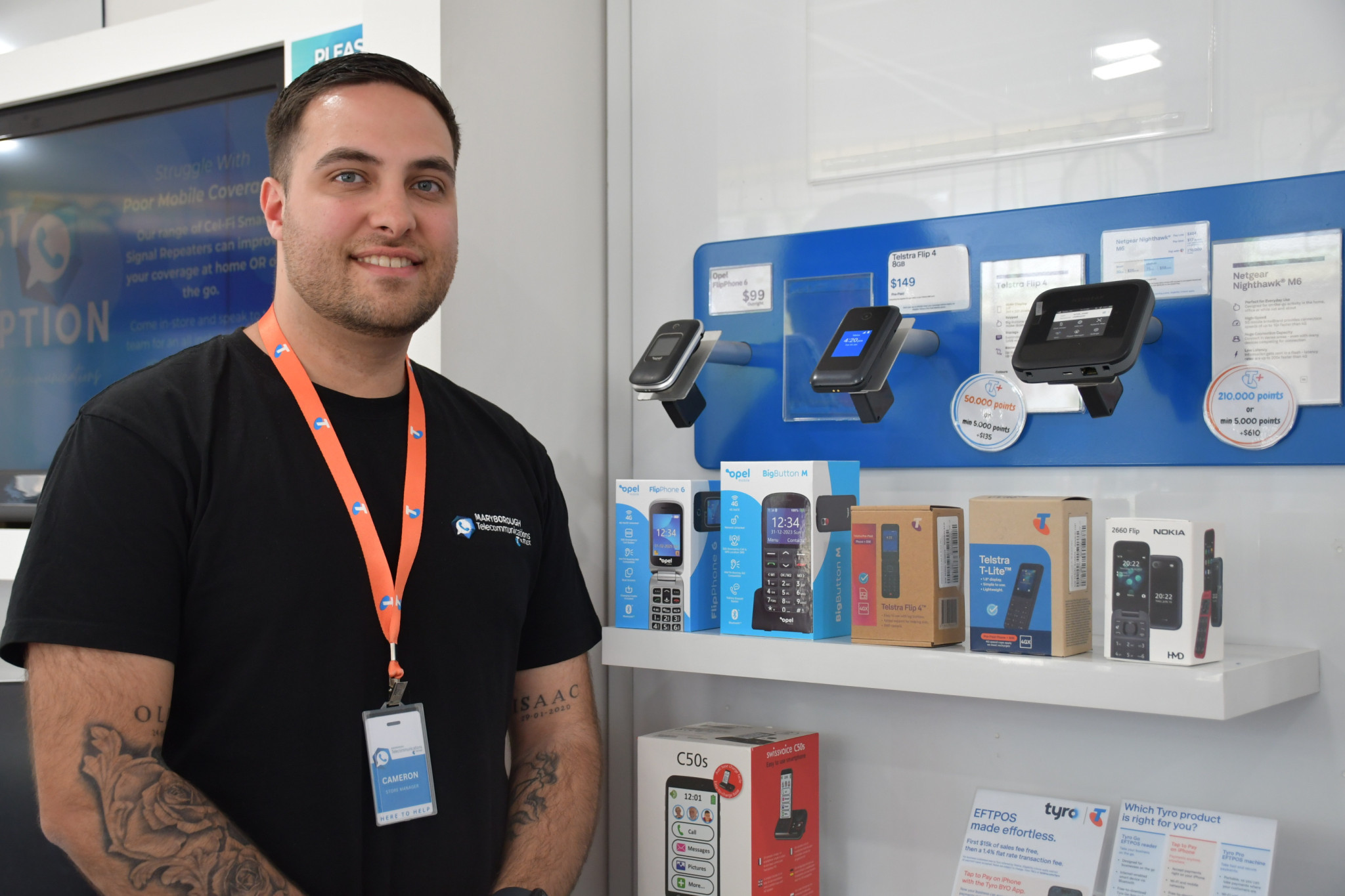 Maryborough Telecommunications owner Cameron Teague with a range of affordable 4G devices people can upgrade to.