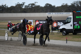 Jason Lee salutes the fans onboard Keayang Zahara as he delivered the 11th straight win for one of Australia’s most exciting trotters.