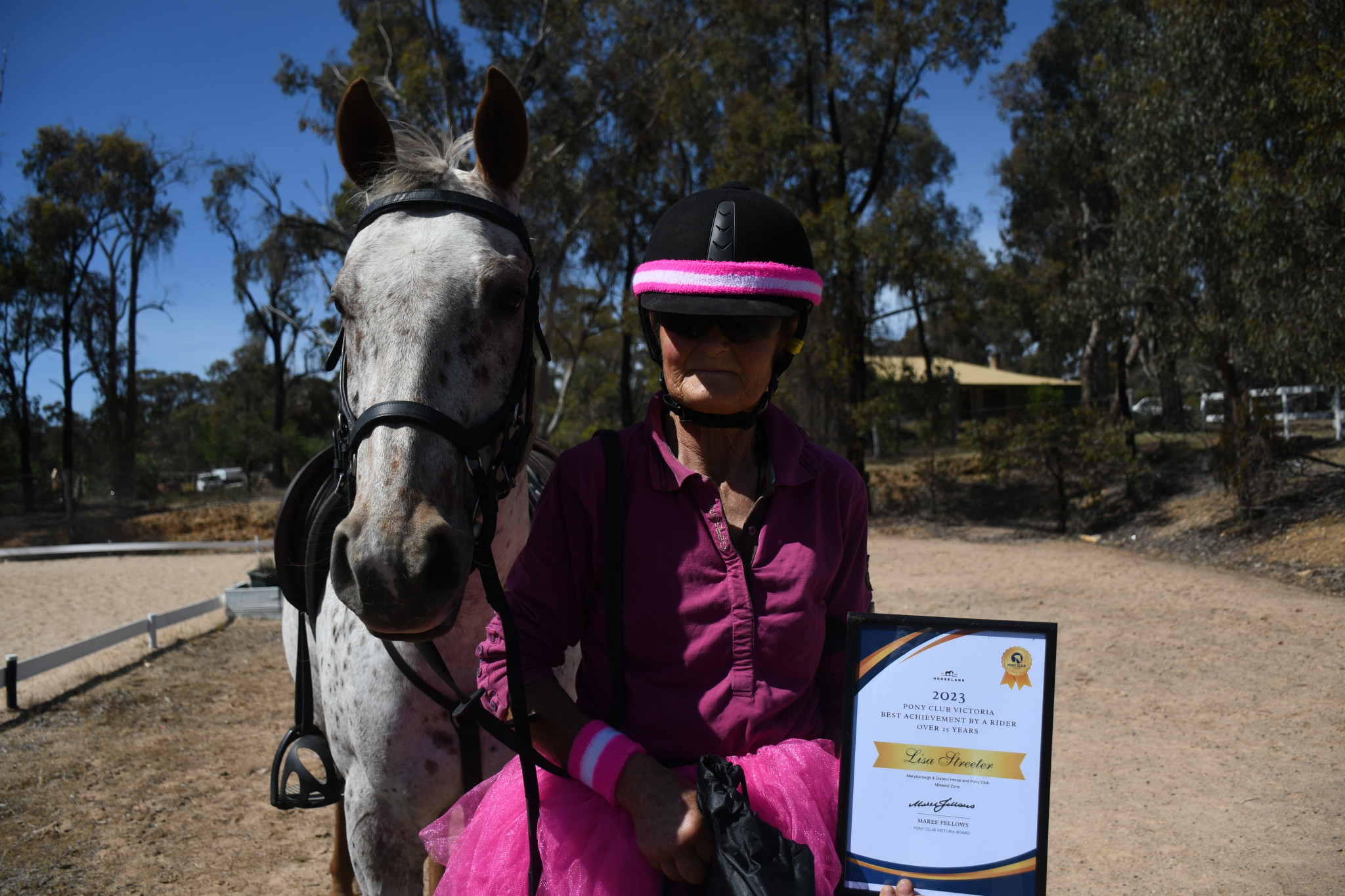 Lisa Streeter with her beloved horse, Dots.