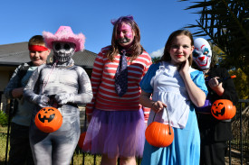 James, Violett, Kara-Leigh, Addison and Noah enjoying trick or treating.