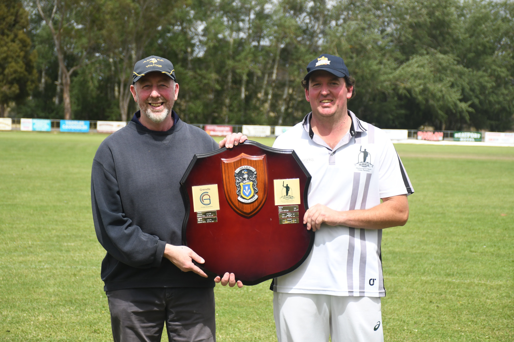 Sam Bartlett (right) with the Sharp Shield, named after Terry Sharp (left).