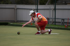 Noel Parratt gets a shot away for Avoca Red.