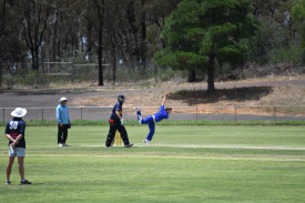 Charlie Scorer gets acrobatic in the search for wickets for Colts.