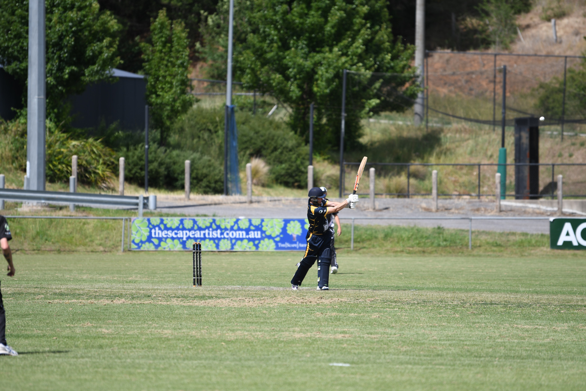 Tom Hart drives for a boundary for Laanecoorie Dunolly.