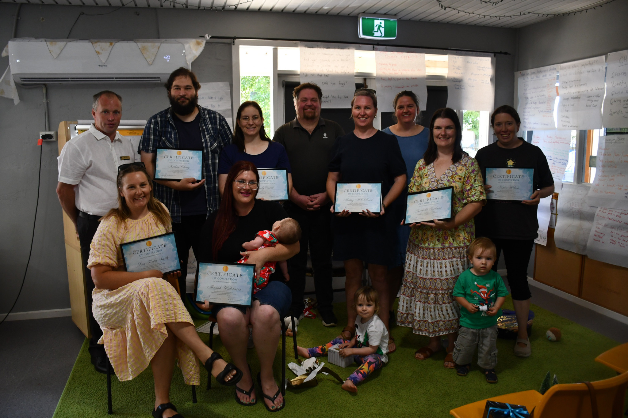 Central Goldfields Shire councillor Jake Meyer with parents who have graduated from the Empowering Parents, Empowering Communities — Being a Parent course.