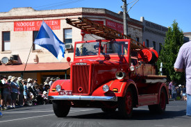 Vintage firetrucks joined the Scottish procession offering a snapshot of the past for crowds.