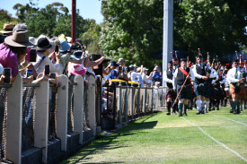 Crowds were keen to catch a glimpse of the mass band performance.