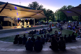 As the sun set people gathered at the Station Domain to listen to local band Chalk.