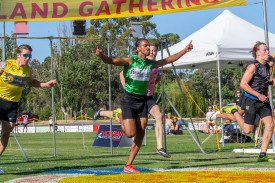 Koswattage celebrates as he crosses the finish line. Photo: Daryl Groves Photography.