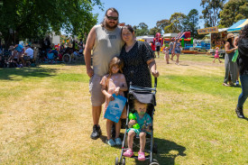 Bethany and Jayme Holland with their kids Addelyn and Primrose Holland.