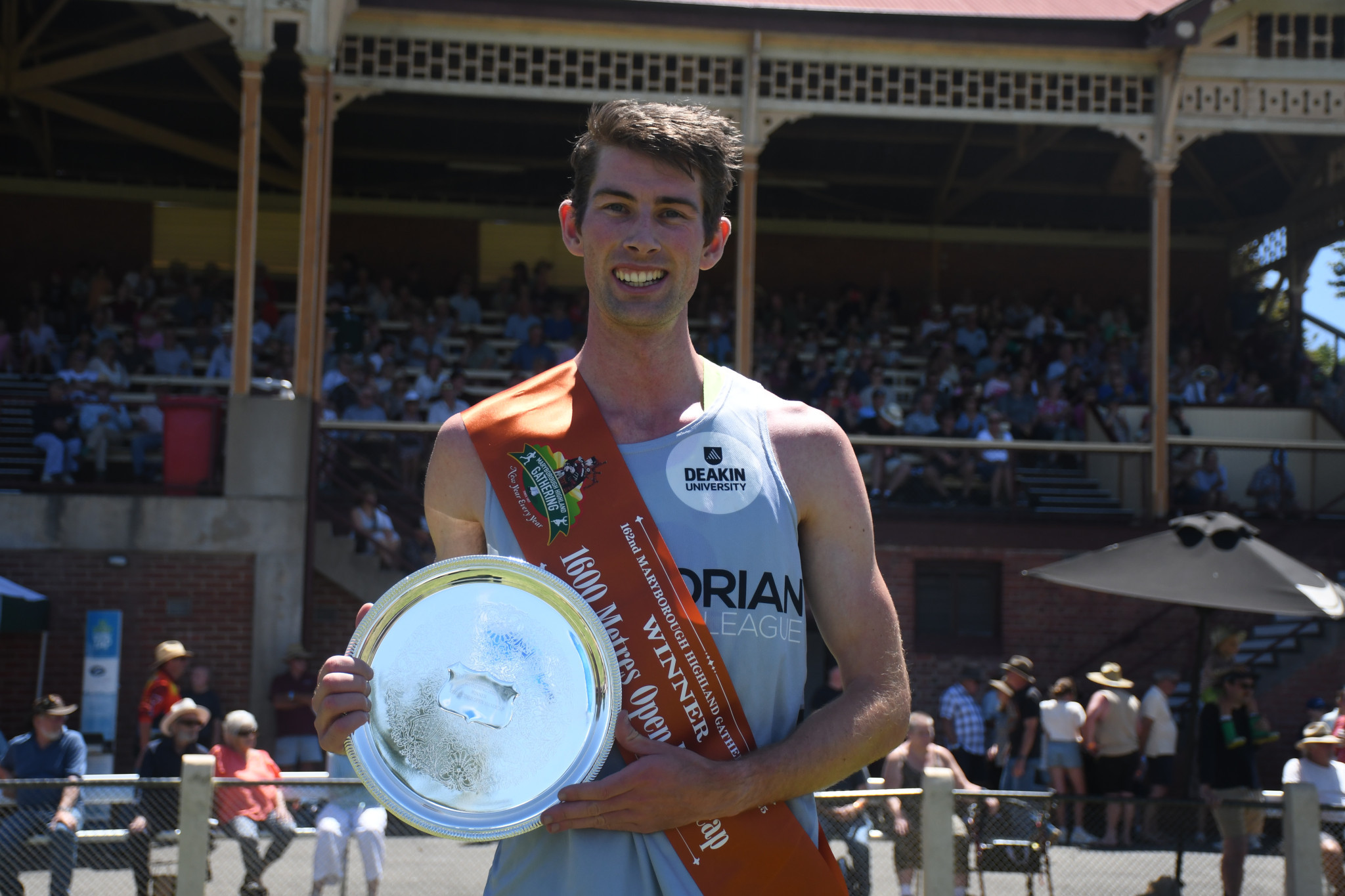 The shield and satchel belongs to Liam Hanrahan after winning a highly competitive 1600 m Open final.