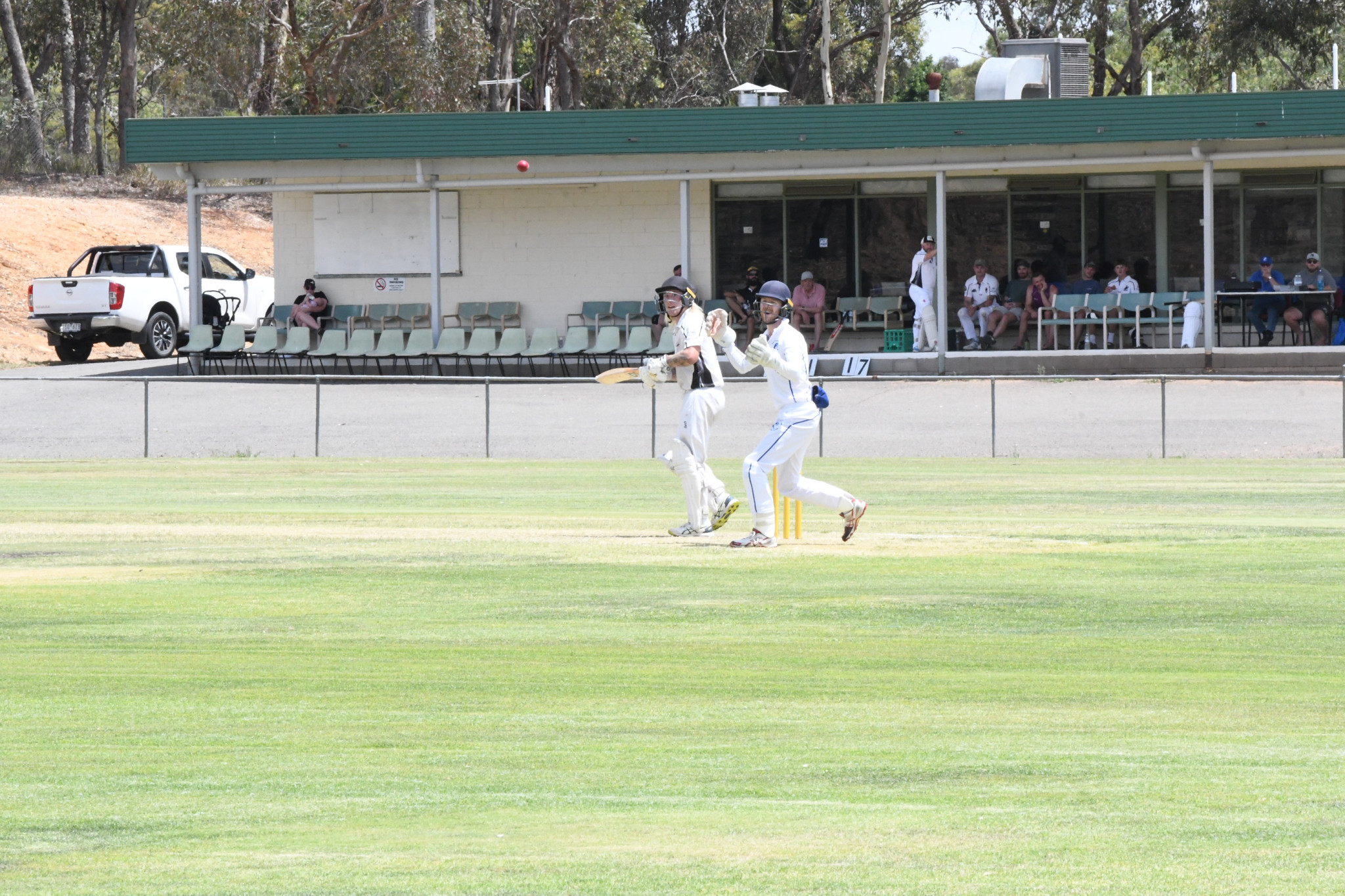 A shot from Jude McGuire lands safe, much to the dismay of Luke Tatchell.