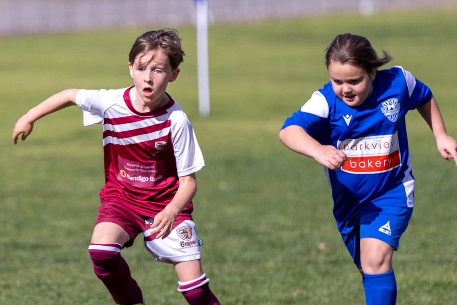 Georgia Eldridge (right) in action for Maryborough under 9s in a match against Creswick last year. Photo: Supplied.