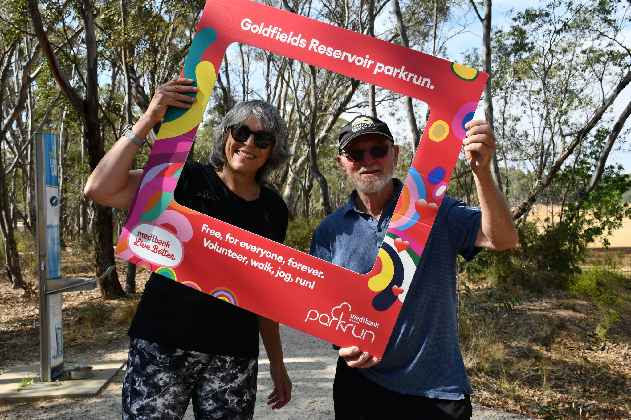 Goldfields Reservoir parkrun volunteer Debbie Macer celebrated with Barry Parsons to commemorate his 100th parkrun.