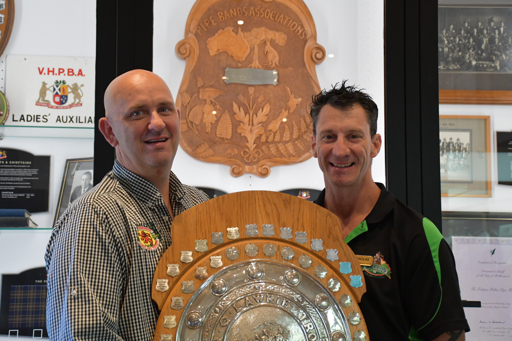 Maryborough Highland Society’s own Malcolm Blandthorn and Nick Weaver among their century-old pipe band history.