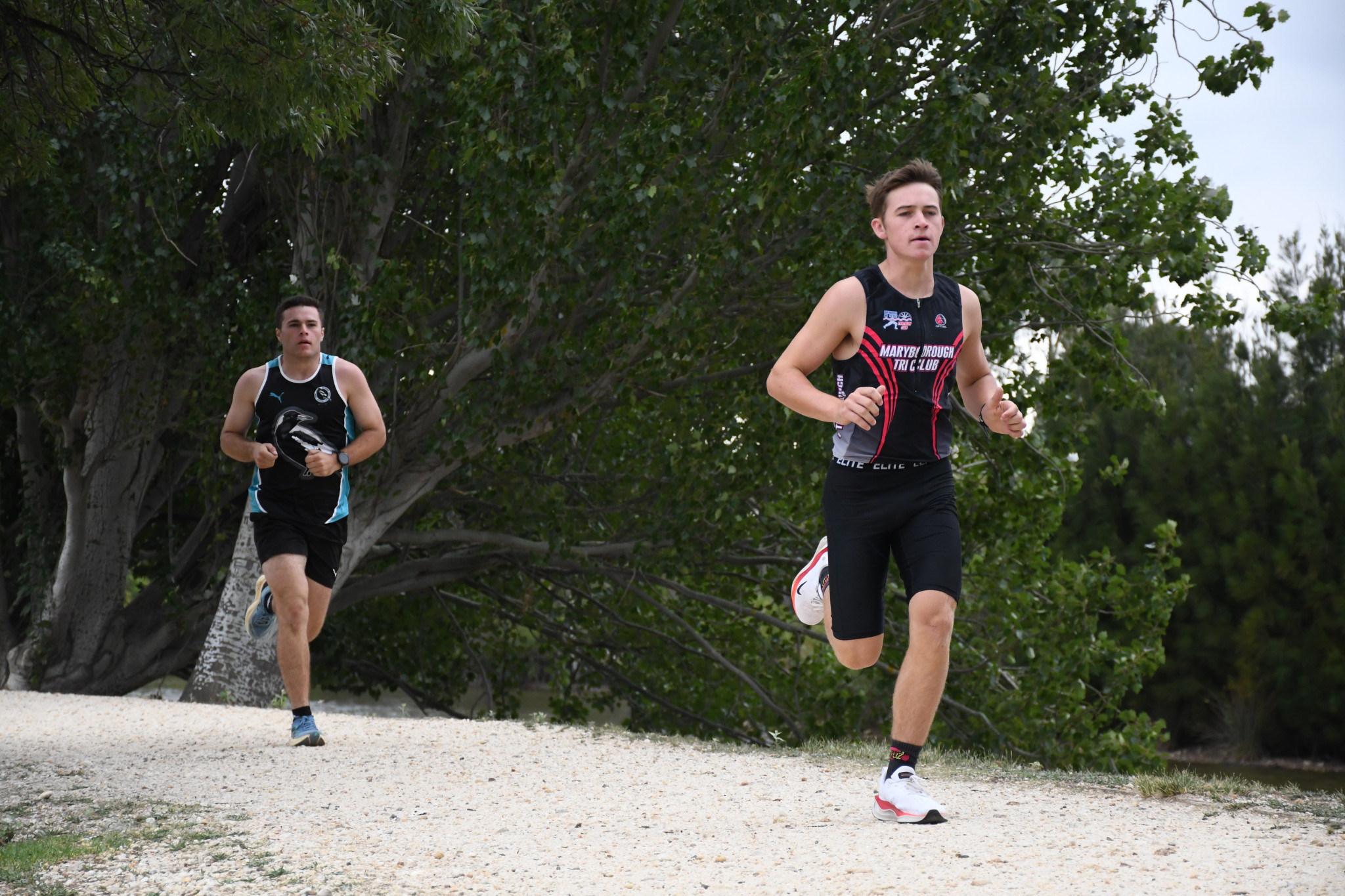 Cooper Mark leading from Josh Britten in the open male duathlon.