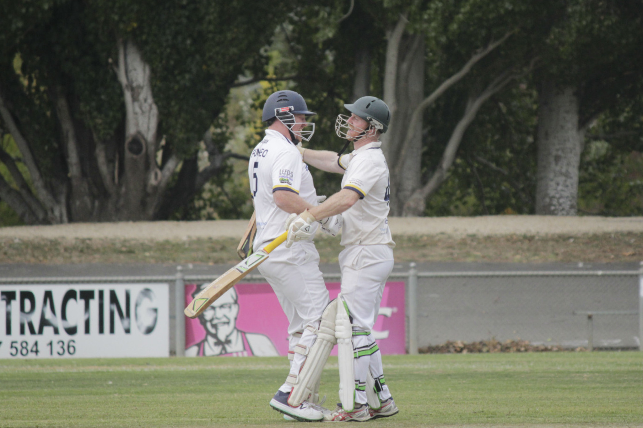 Matt Smith and Daniel Romeo celebrate the 22/23 title.